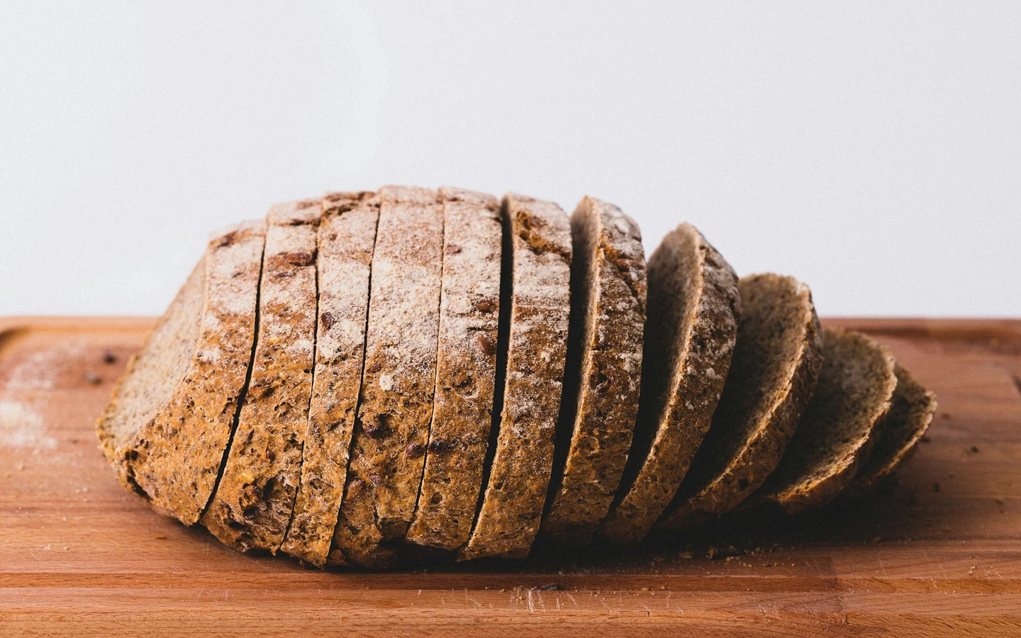 Cut bread reveals the pattern of air cells inside its crumb.
