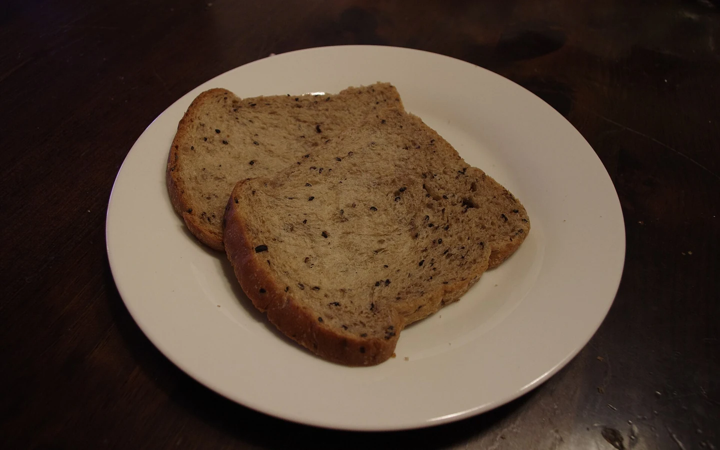 Slices of Japanese yudane bread show the loaf's close-textured crumb.
